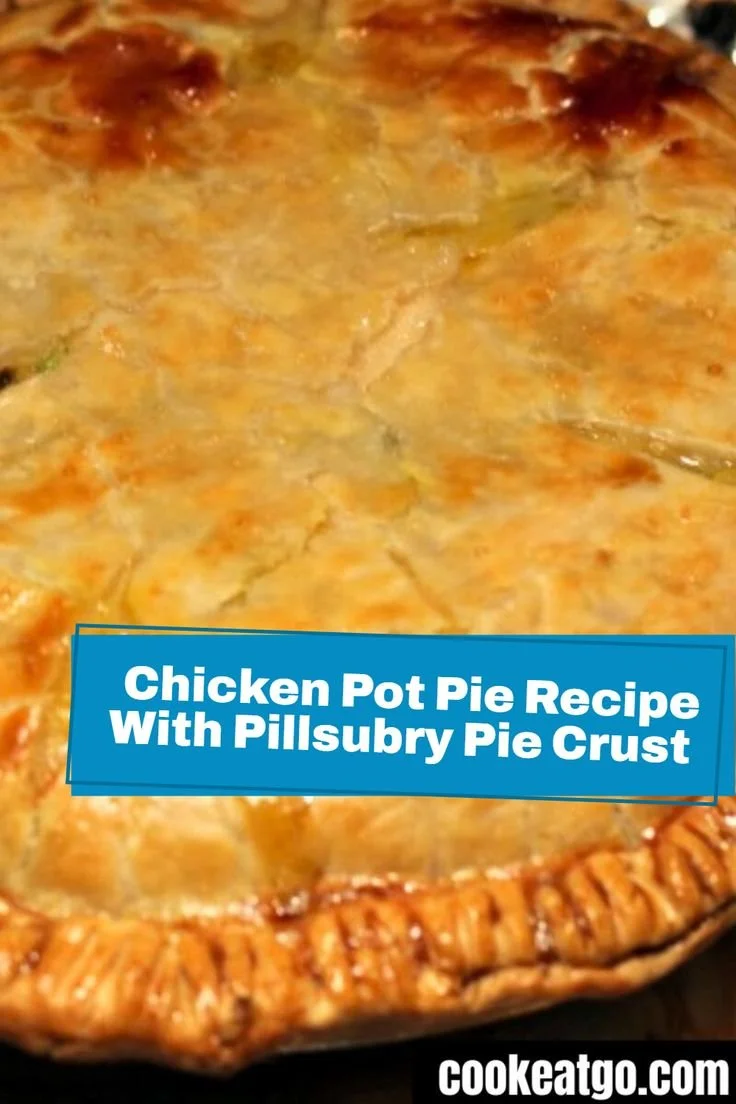 Homemade chicken pot pie with Pillsbury pie crust, fresh vegetables, and creamy filling.