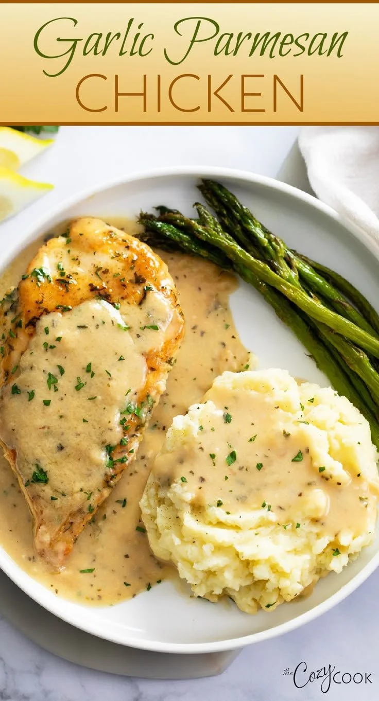 Delicious Garlic Parmesan Chicken served with herbs and cheese