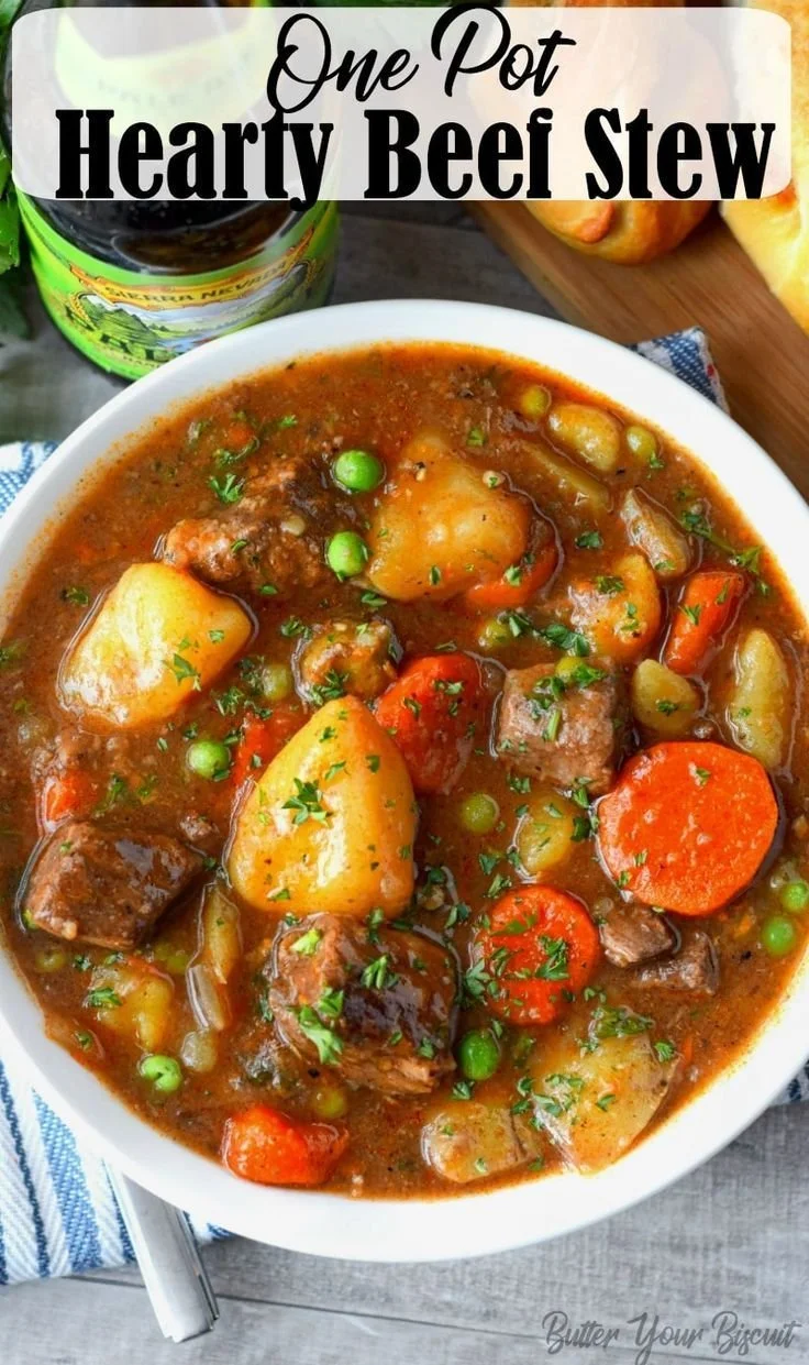 Delicious bowl of hearty beef stew with vegetables and herbs