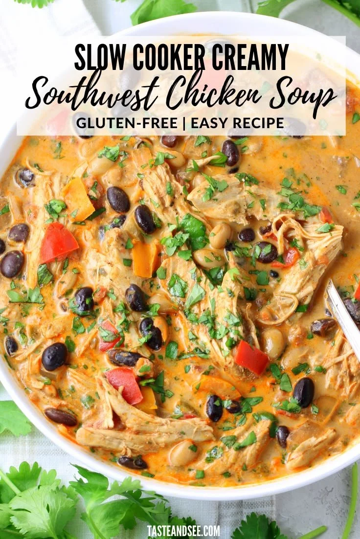 Bowl of creamy Southwest Chicken Soup in a slow cooker with fresh ingredients