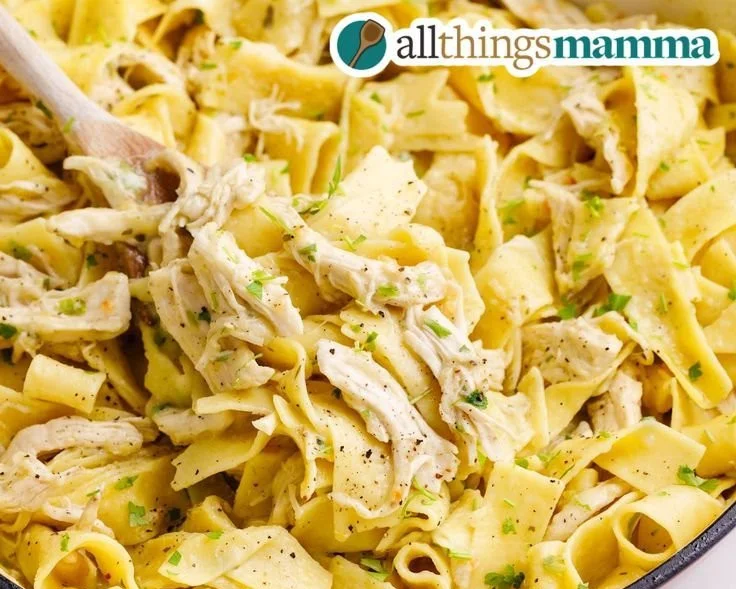 Delicious stovetop chicken and noodles served in a bowl, perfect for a meal.