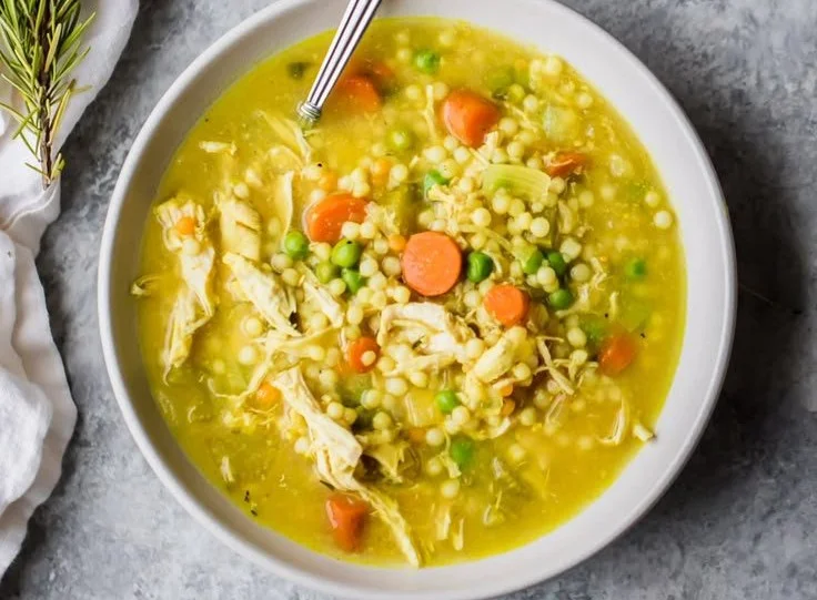 Bowl of the best homemade chicken soup with fresh ingredients