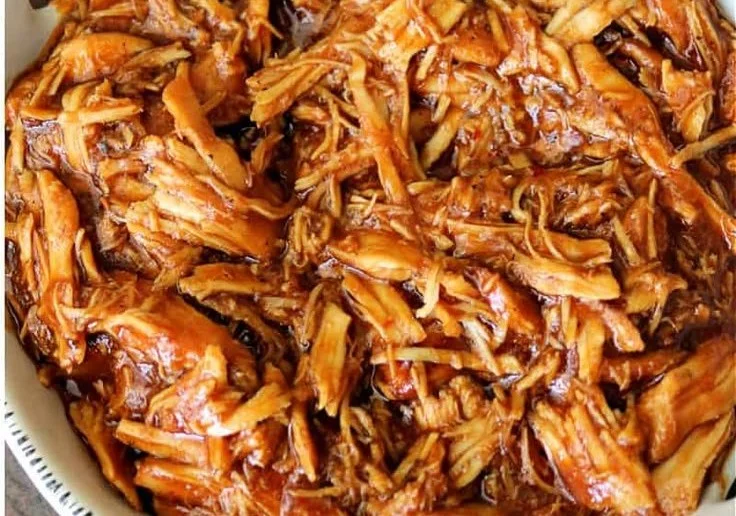 Delicious crockpot BBQ chicken served on a plate