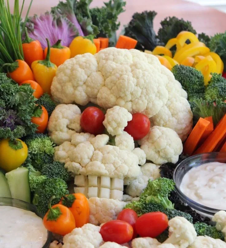A spread of Halloween finger foods including spooky-themed snacks and treats.
