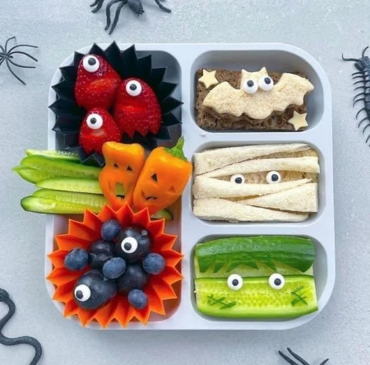Creative Halloween themed lunch in plant-based divided plates for kids.