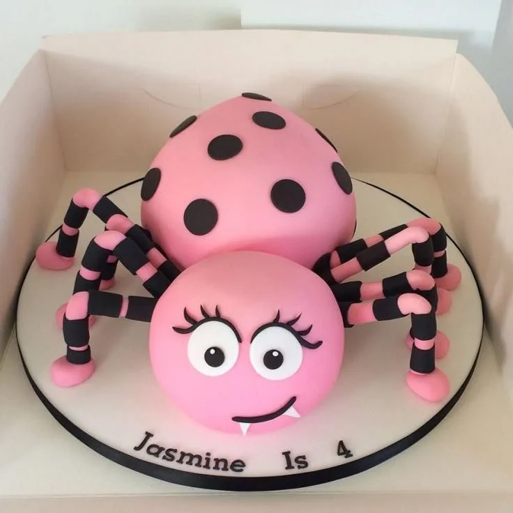 Delicious Halloween cake featuring a cute ladybug design for festive celebrations