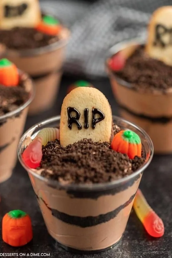 Spooky Halloween Dirt Cups decorated as a graveyard treat