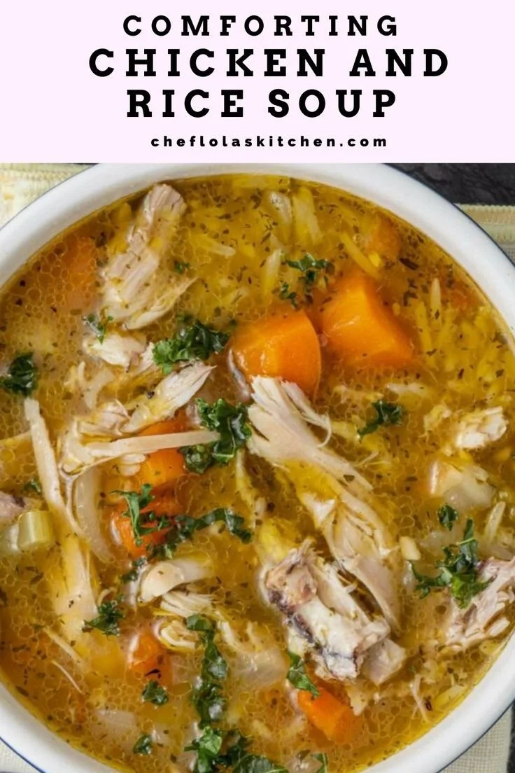 Bowl of homemade chicken and rice soup with herbs and vegetables
