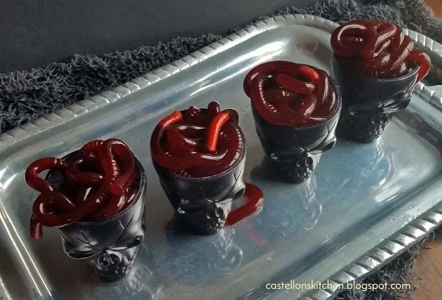 Colorful squirmy wormy shots served in shot glasses for a fun party