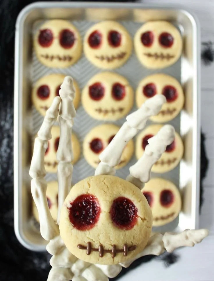 Thumbprint cookies filled with raspberry jam for Halloween baking