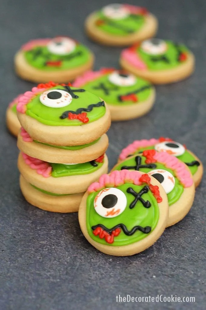Decorative zombie cookies for Halloween party treats with video tutorial.